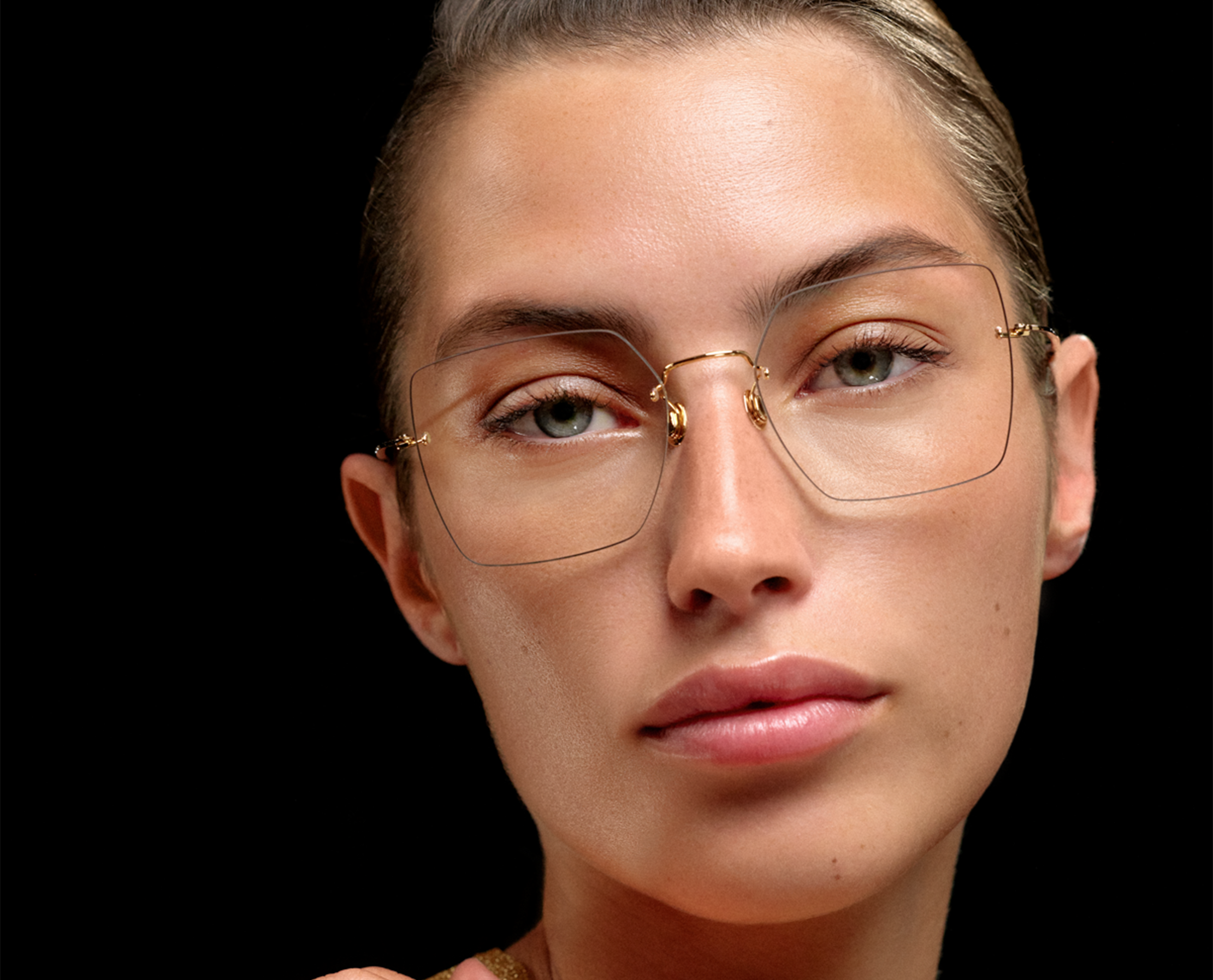 Model wearing handcrafted LINDBERG Precious eyewear
